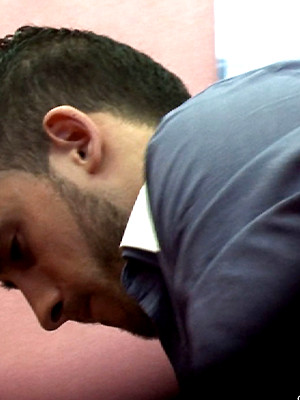 XXX gay photos of Horny young man entering a swimming pool cubicle to change for a swim.