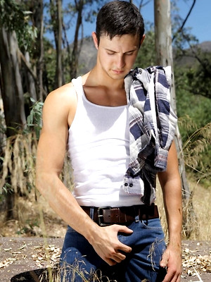 Gay porn pics Josh Conners loves being naked outside.  He jerks his cock, plays with his furry hole and shoots a huge load all over his smooth chest.