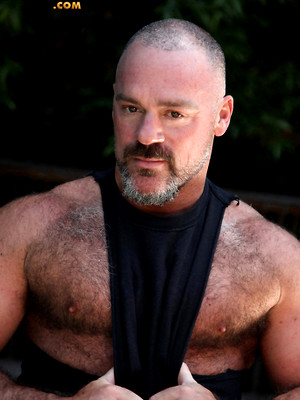 Gay sex pics with Bronson Gates shows his muscle hairy body