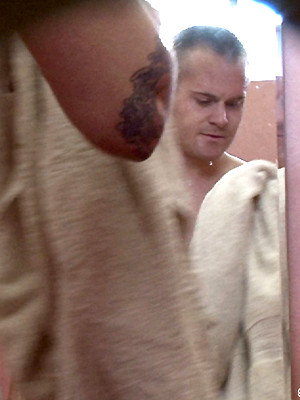 XXX gay photos of Horny, muscular swimmer coming back for another swim.