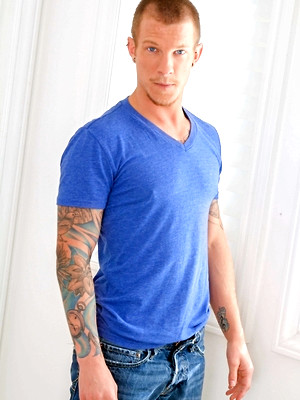 Gay male in Jaxon Colt stripping and plays with a dildo