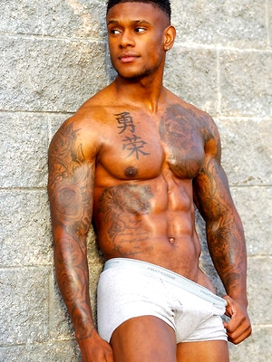 Free gay porn pics with Juicy New Stud Calvin Beckham Shows Off His Favorite Muscle!