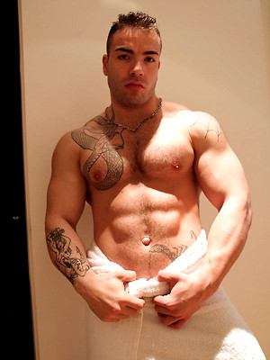 XXX gay photos of Massive Max Hilton flexes and strips for Ben