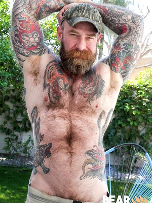 Gay porn pics Jack Dixon shows his hairy muscled body and pierced dick