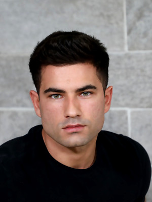 Free gay porn pics with Sexy tattoed stud shows his cock