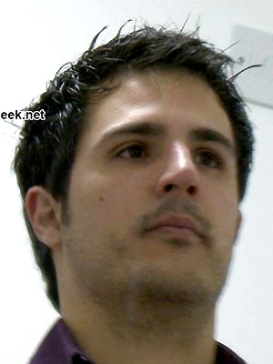 Gay pics of The pervy cameraman at Sneakypeek catches a hunky workman coming into the bus station toilet to have a crap.