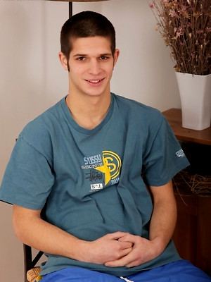 Gay pics of Johan Zarks on his knees spreading his hairy ass.