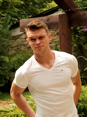 XXX gay photos of Hard bodied Justin Lovers strokes his cock outdoors.