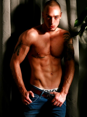 XXX gay photos of showing his muscles