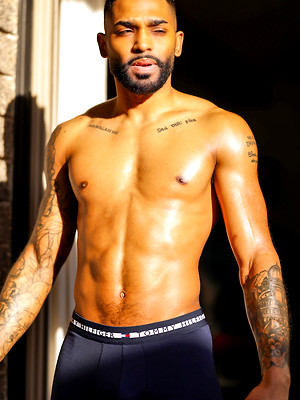 Gay male in Tatted Stud James Harp Does The Stroke 'N Poke For The Cameras!