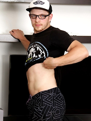 Gay male in Lucas Solowski busts a nut onto his tan lined chest.