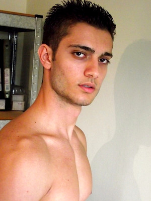 Gay sex pics with Rocco plays with cock