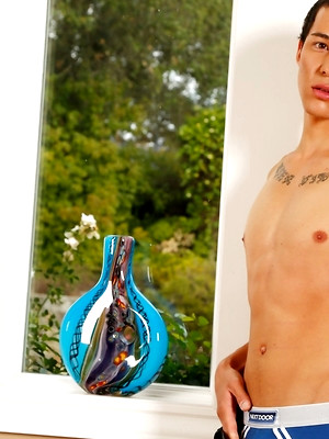XXX gay photos of Teenage stallion Ashton Miller shows off his sexy tattooed body and hard dick