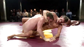 Free gay sex with Four hot studs fight for the right to fuck in front of a live crowd!