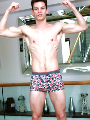 Gay sex pics with Ultra-Lean MMA Fighter Alex Wanks his Thick Uncut Cock & Shoots a Big Load of Jizz all over Himself!