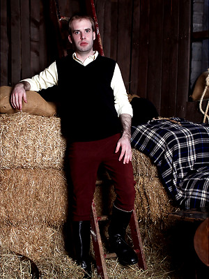 Gay porn pics Gay stud masturbating his hard cock inside a barn