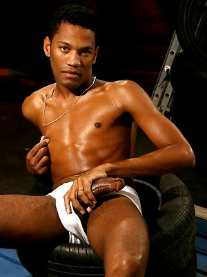 Gay sex pics with Sexy english lad strokes his black cock