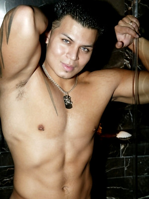 Gay porn pics Hot muscle latino Alan shows his fat uncut cock.